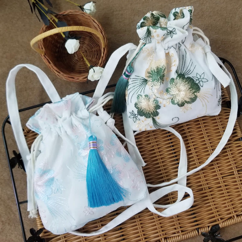 Bolso bandolera de lona con Buddha Stones , flores bordadas y flores de cerezo enredaderas.