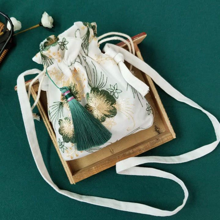 Bolso bandolera de lona con Buddha Stones , flores bordadas y flores de cerezo enredaderas.