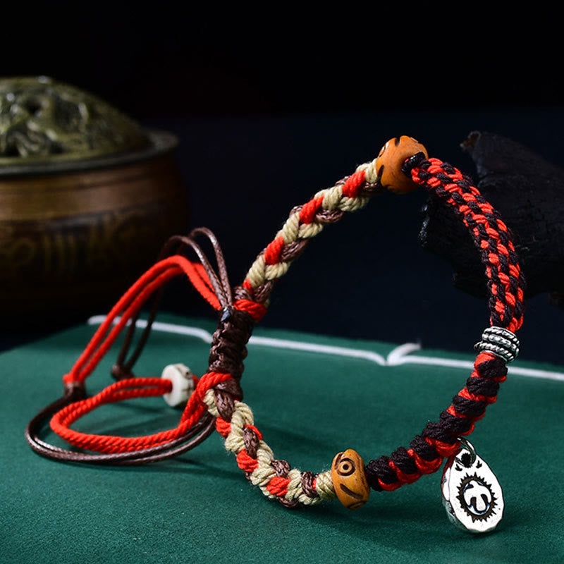 Pulsera de la suerte con hilo de Garuda tibetano tejido a mano con Buddha Stones