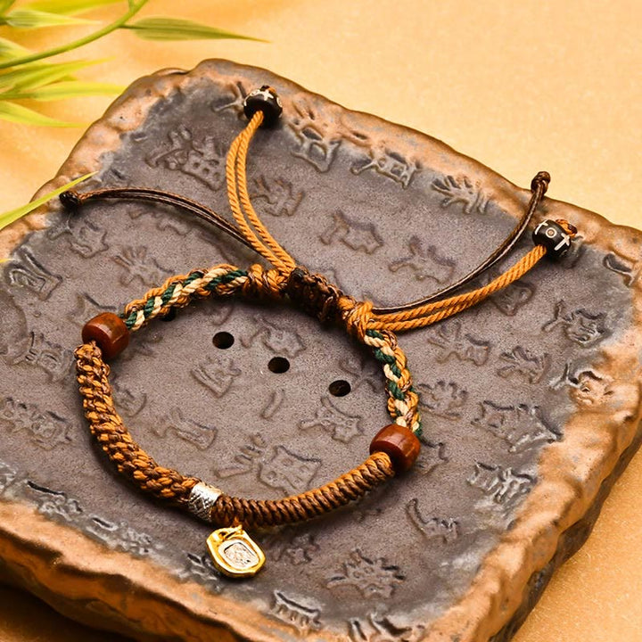 Pulsera trenzada de madera con protección de la diosa de la riqueza tibetana Zakiram hecha a mano con Buddha Stones