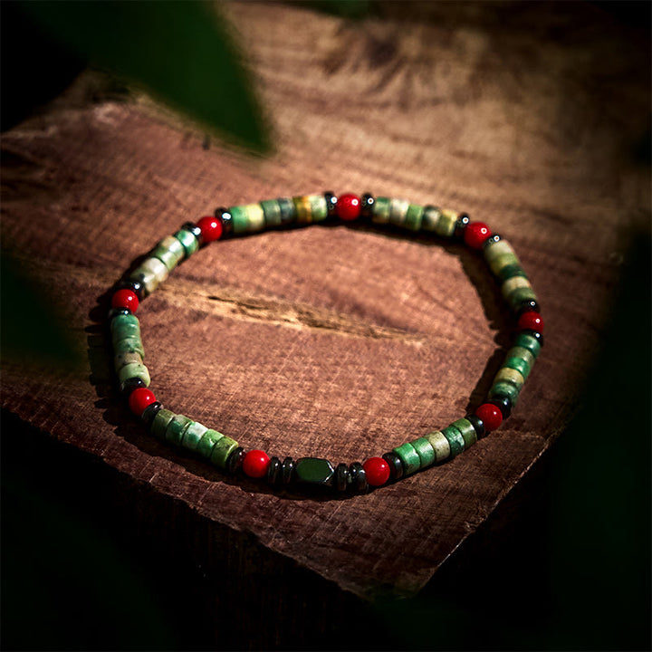 Pulsera poderosa de hematita y coral rojo con piedras verdes naturales de Buddha Stones