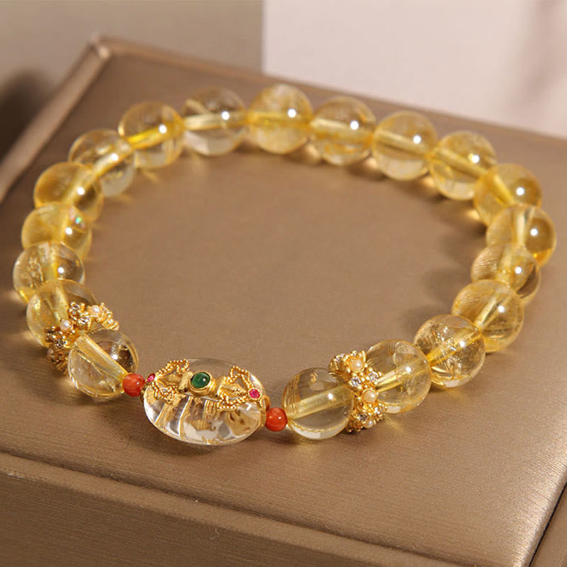 Pulsera de auspiciosidad con cuentas de cuarzo rutilado dorado natural de Buddha Stones