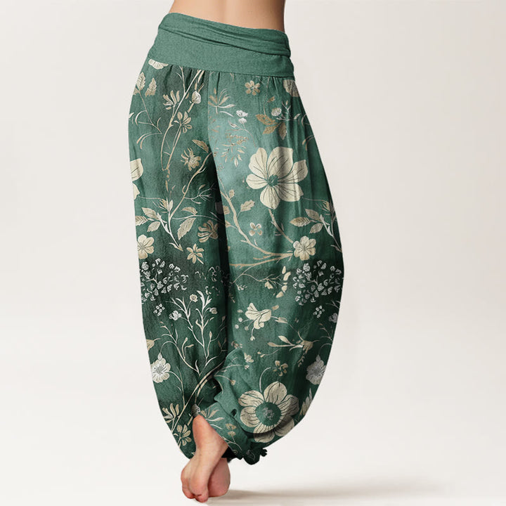 Pantalones harén para mujer con cintura elástica y diseño de flores blancas y vides sinuosas. - image 2
