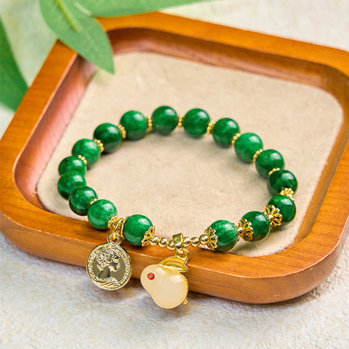 Pulsera con encanto de conejo y calcita verde de Buddha Stones