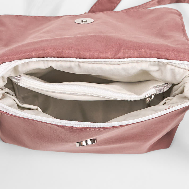 Bolso bandolera de lino y algodón con bordado de Buddha Stones , color marrón liso y ciruela.