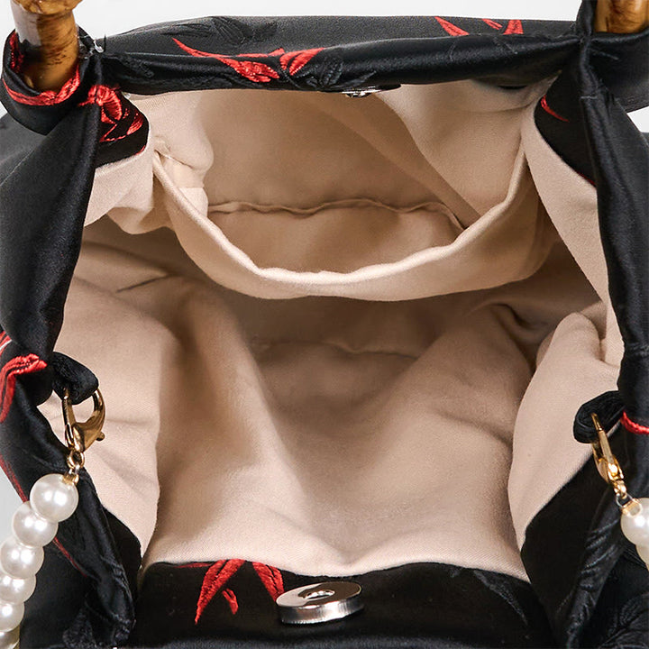 Bolso bandolera con Buddha Stones y asa de bambú y perlas.