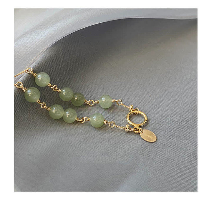 Pulsera con cuentas de suerte llena de oro de 14 quilates con jade hetiano natural único de Buddha Stones - image 11