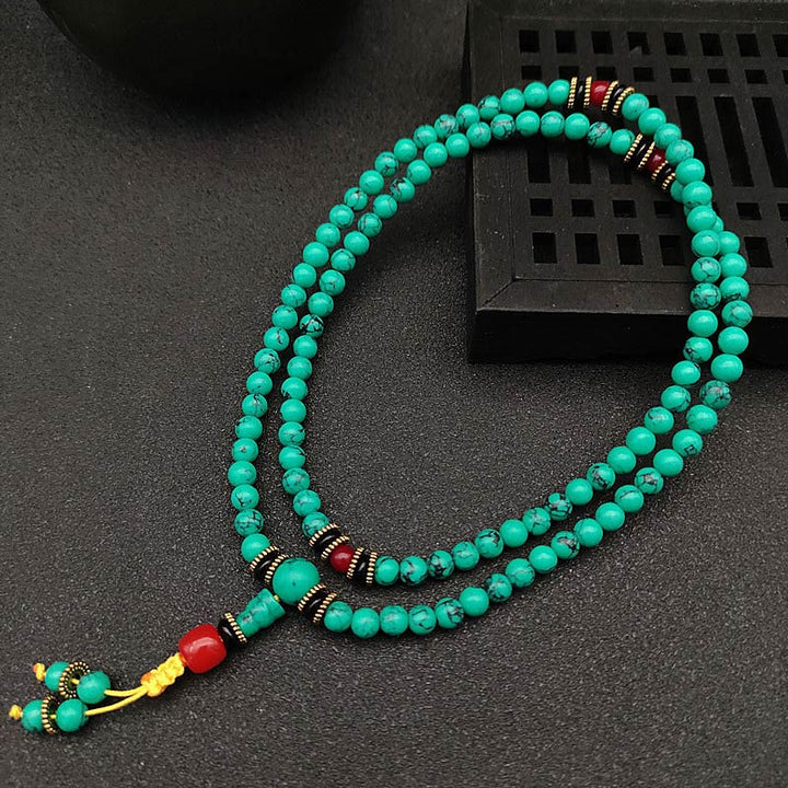 Pulsera Mala curativa de turquesa tibetana con Buddha Stones