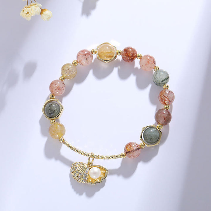 Pulsera de cuentas de protección de concha de cuarzo rutilado de colores naturales con Buddha Stones