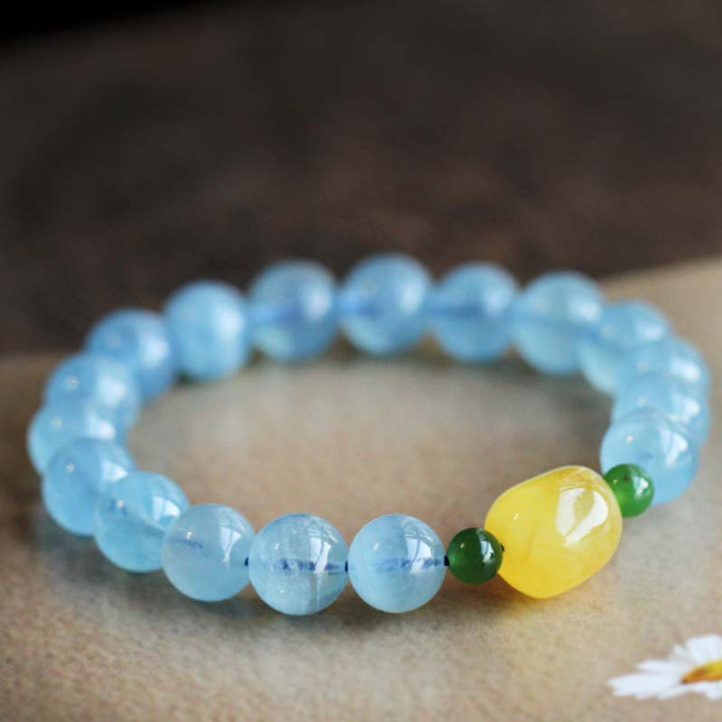 Pulsera curativa de serenidad con cuentas de ámbar y aguamarina natural