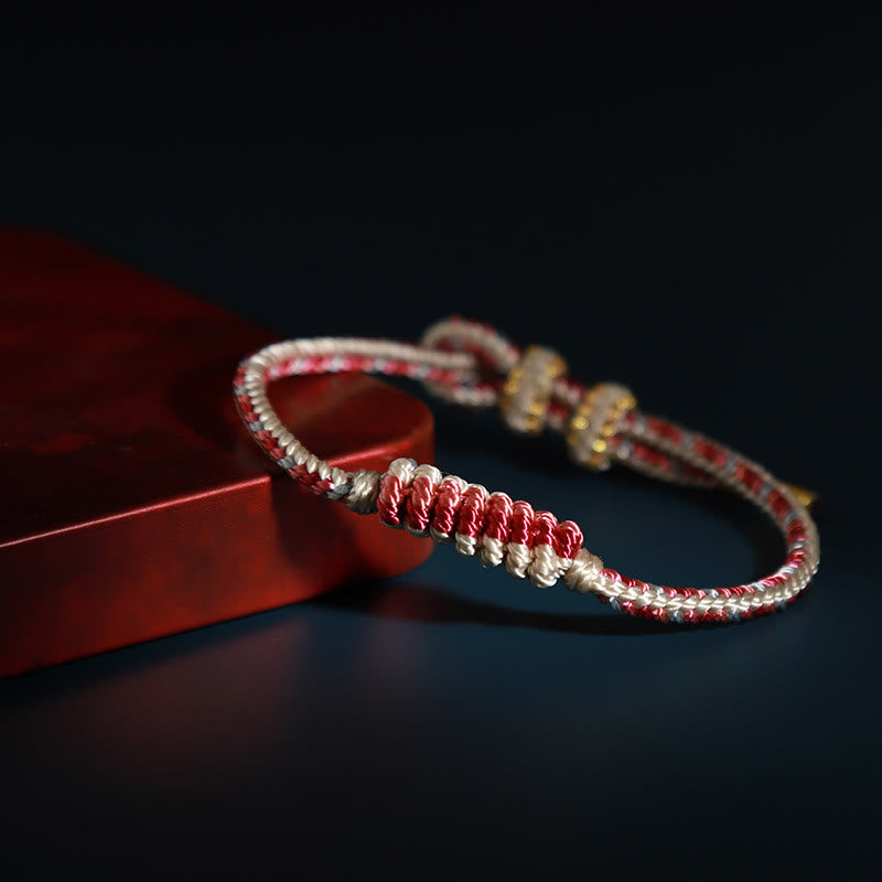 Pulsera de protección trenzada con rueda de oración, nudo de la paz, hecho a mano, con Buddha Stones tibetanas