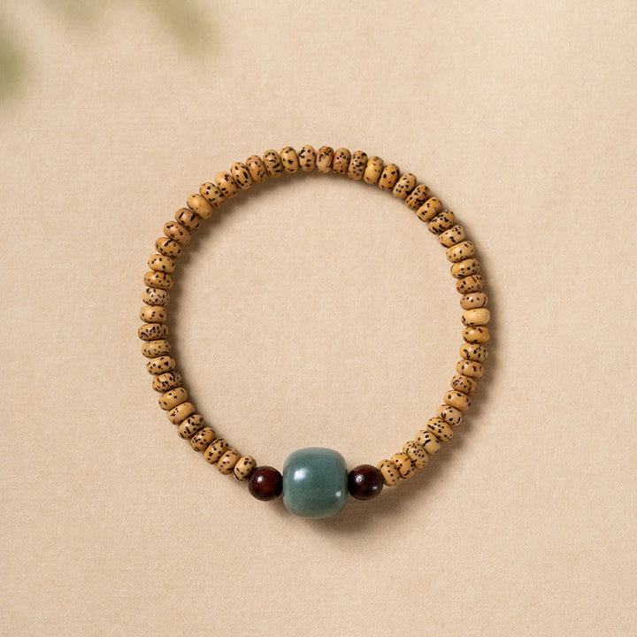Pulsera de sabiduría de sándalo rojo con hojas pequeñas y semillas de Bodhi de Buddha Stones