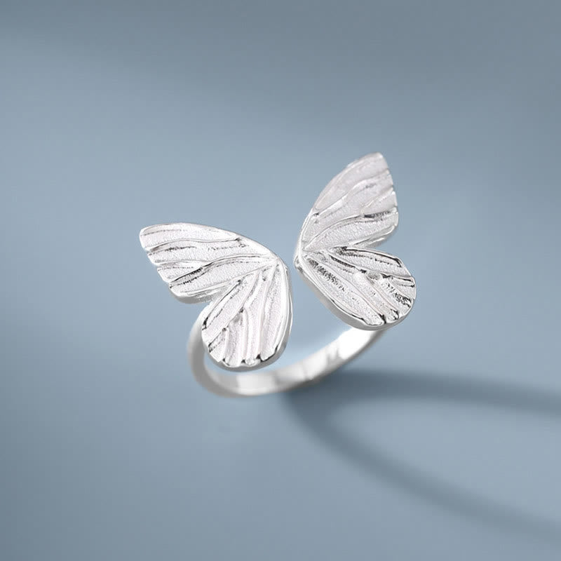 Anillo de libertad de amor con mariposa de plata de ley 925 con Buddha Stones