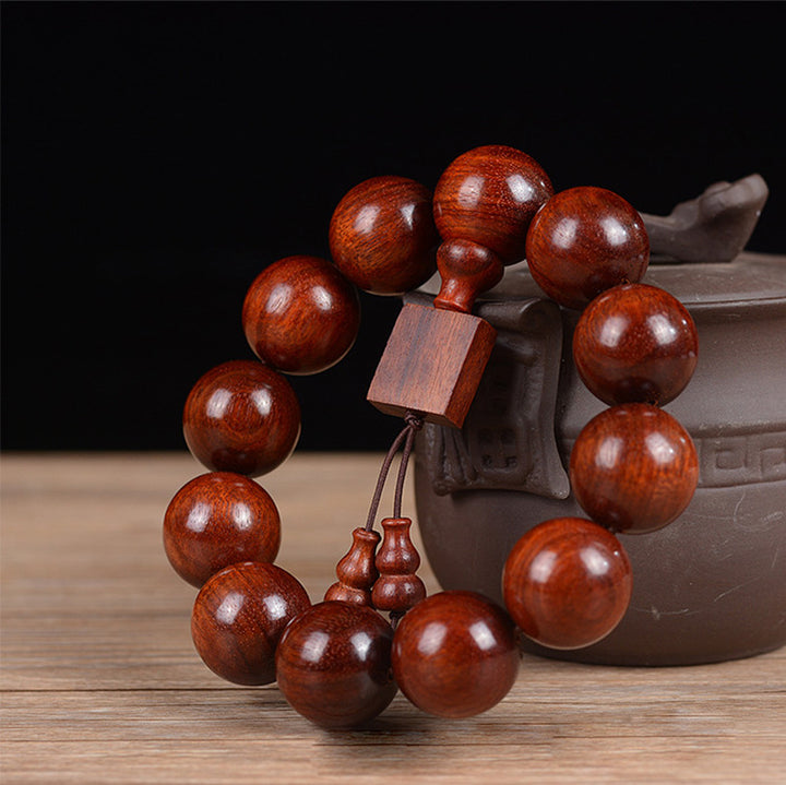 Pulsera de relajación de sándalo rojo de hoja pequeña tibetana con Buddha Stones