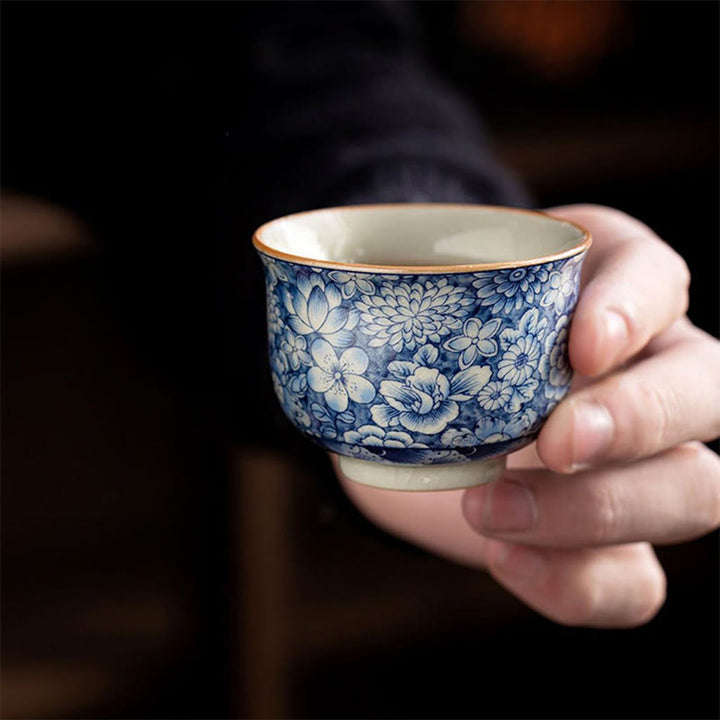 Tazas de té de cerámica de crisantemo con flor de ciruelo y peonía de loto Vintage con Buddha Stones
