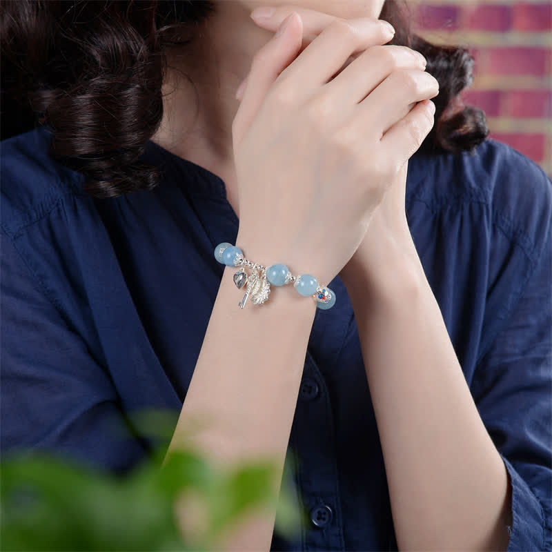 Pulsera con dije de llave de amor con flor de serenidad de aguamarina natural de plata de ley 925