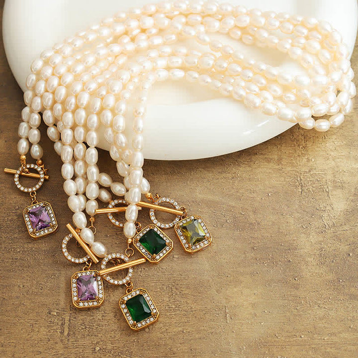 Colgante de collar con dije de riqueza de circonitas y perlas