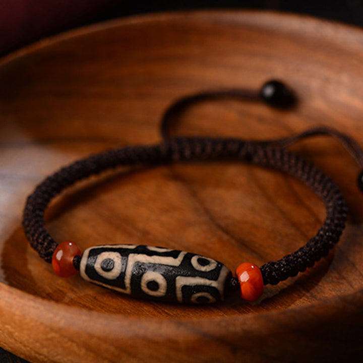 Pulsera de hilo de prosperidad con cuentas Dzi tibetanas de nueve ojos con Buddha Stones