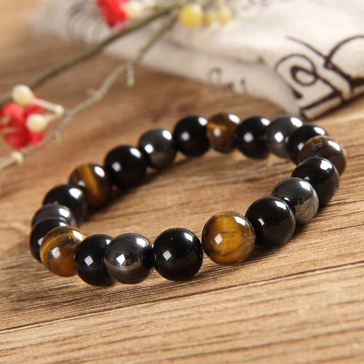 Juego de collar y pulsera con ojo de tigre tibetano con Buddha Stones