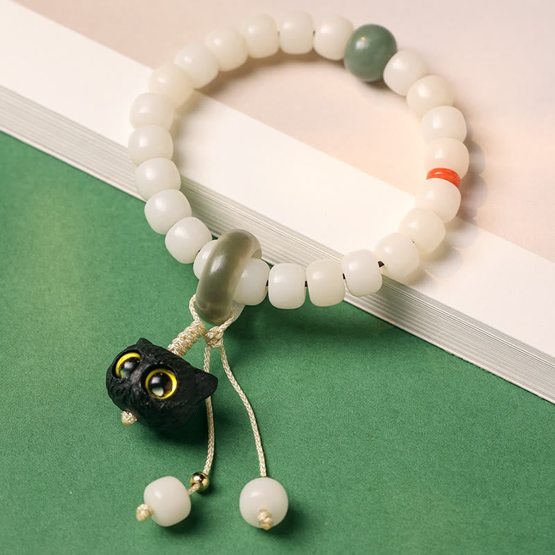 Pulsera de armonía de paz con dije de gato encantador de madera negra africana con semillas de Bodhi naturales de Buddha Stones - image 2