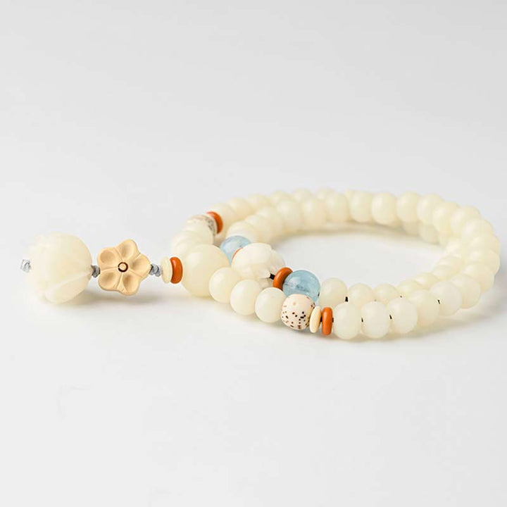 Pulsera de bendición de loto Bodhi de jade blanco tibetano con Buddha Stones