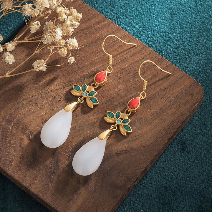 Pendientes colgantes de la suerte de jade blanco FengShui con Buddha Stones