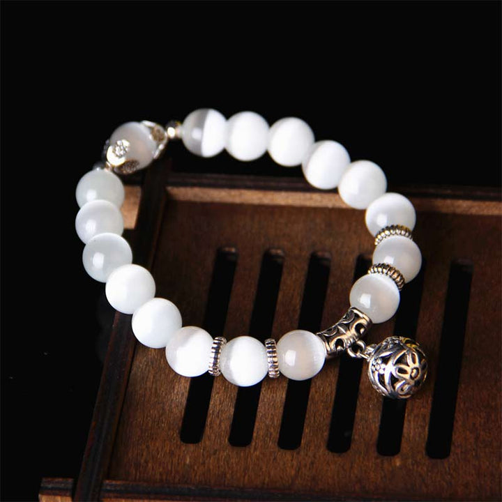 Pulsera de la suerte con ojo de gato tibetano y Buddha Stones