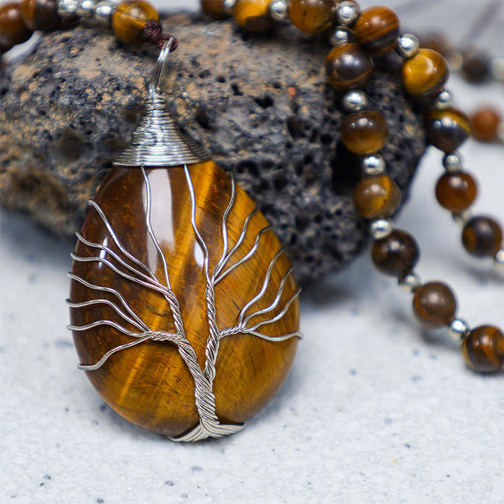 Collar con colgante de cuentas de fuerza de ojo de tigre natural de Buddha Stones