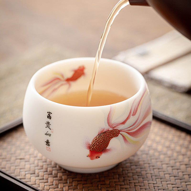 Taza de té de cerámica de porcelana blanca, pez Koi, Buddha Stones, taza de té de Kung Fu