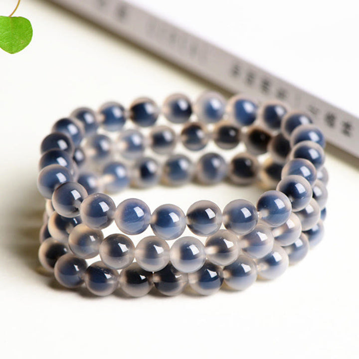 Pulsera de cuentas de fuerza de armonía de ágata de caramelo colorida natural de Buddha Stones
