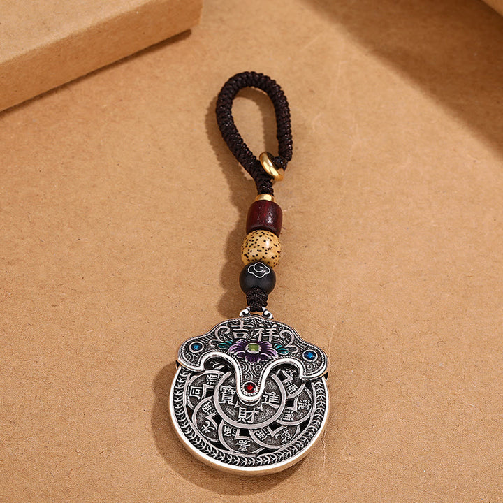 Llavero de riqueza auspiciosa con moneda de cobre y flor de peonía con Buddha Stones