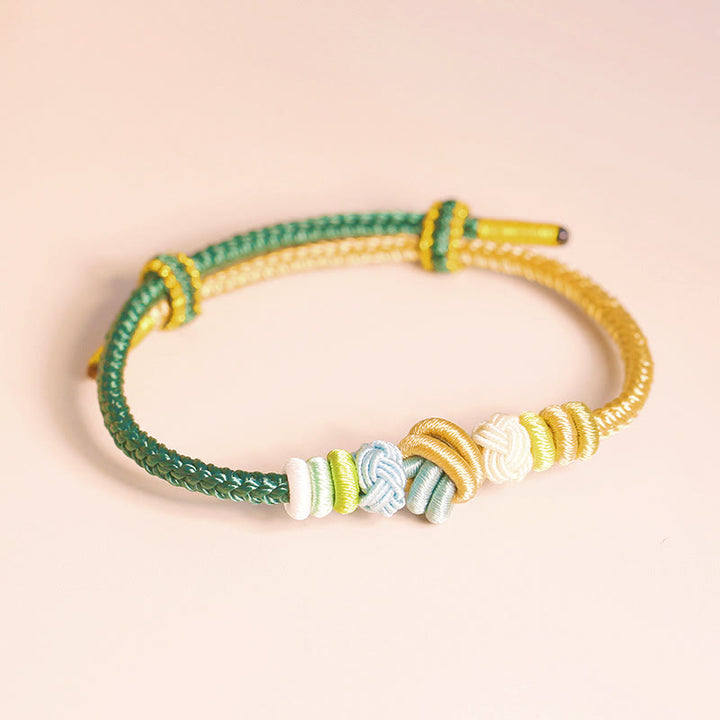 Pulsera de conexión de suerte con nudo de paz de ocho hilos hecha a mano con cuerda de dos colores con Buddha Stones