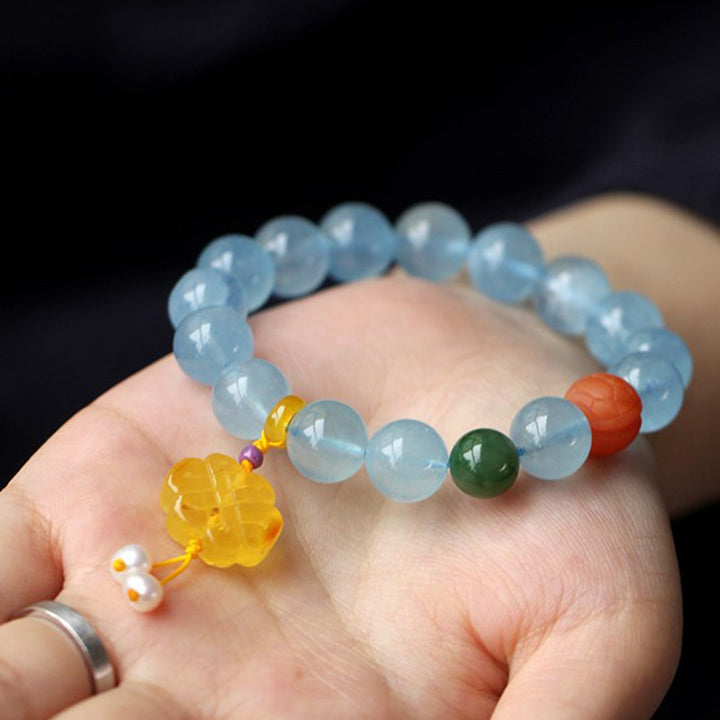 Pulsera de la paz con dije anudado chino, ámbar, aguamarina natural