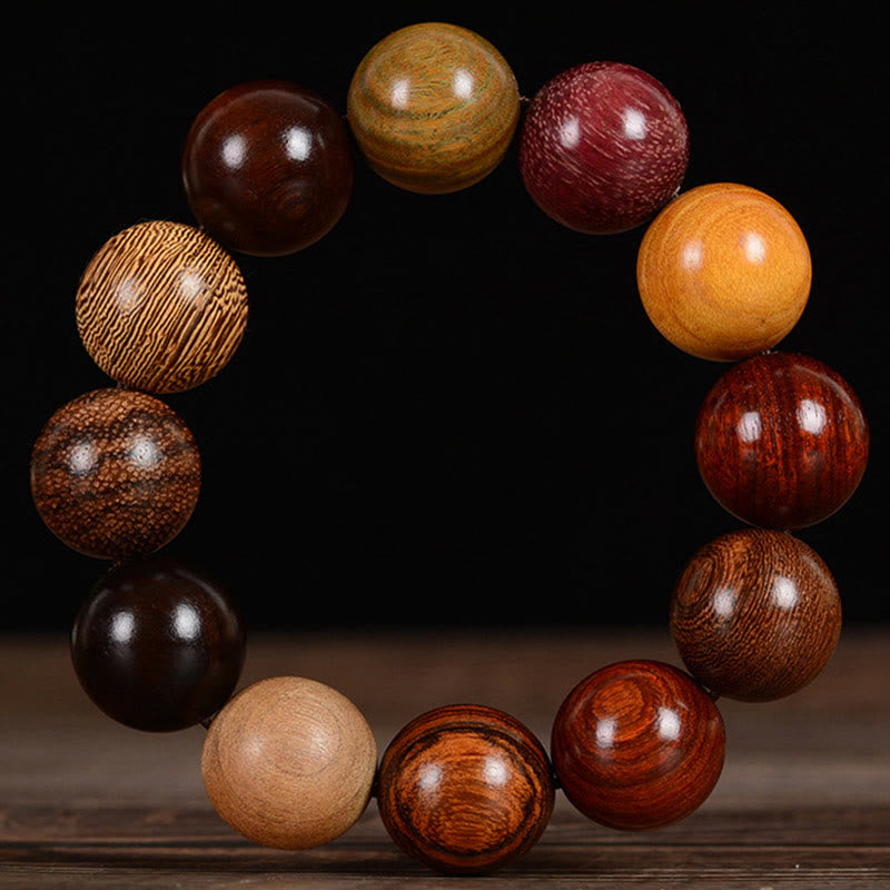 Pulsera curativa de protección de sándalo multicolor con Buddha Stones