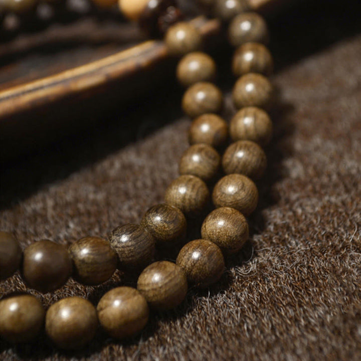 Pulsera Mala con dije de protección de sándalo tibetano