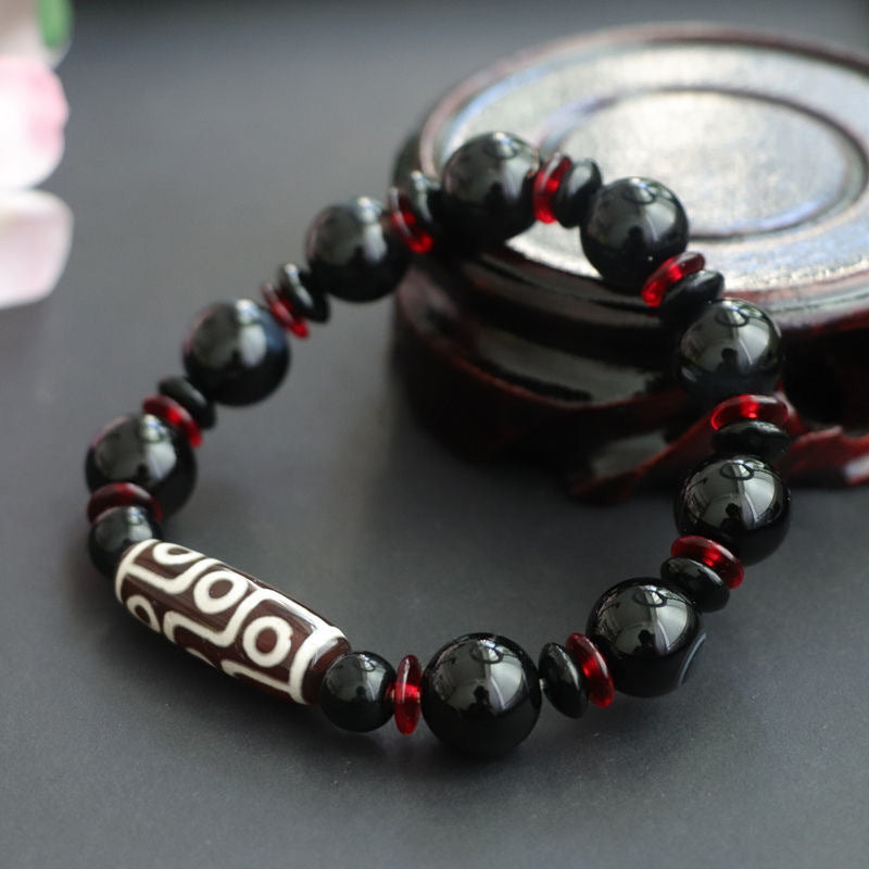 Pulsera de protección de la riqueza con cuentas Dzi de nueve ojos de ónix negro y Buddha Stones