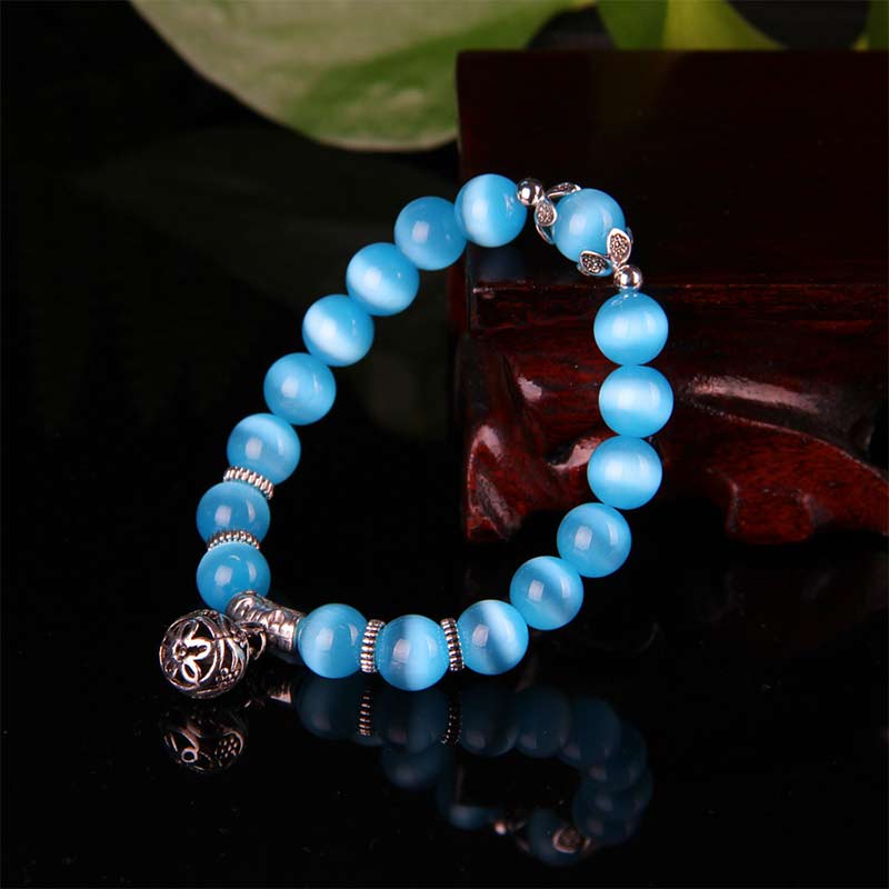 Pulsera de la suerte con ojo de gato tibetano y Buddha Stones