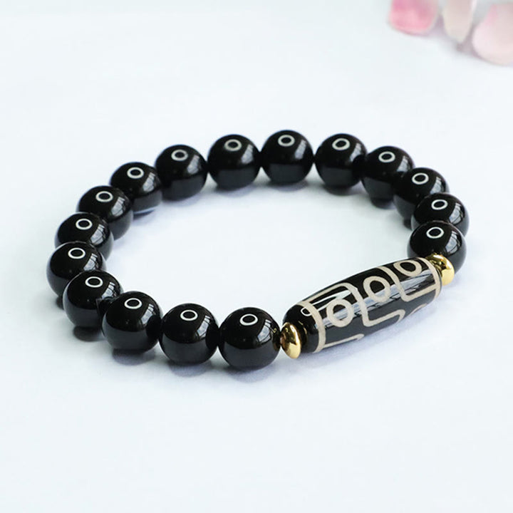 Pulsera de poder de ónix negro con cuentas Dzi tibetanas de nueve ojos de Buddha Stones