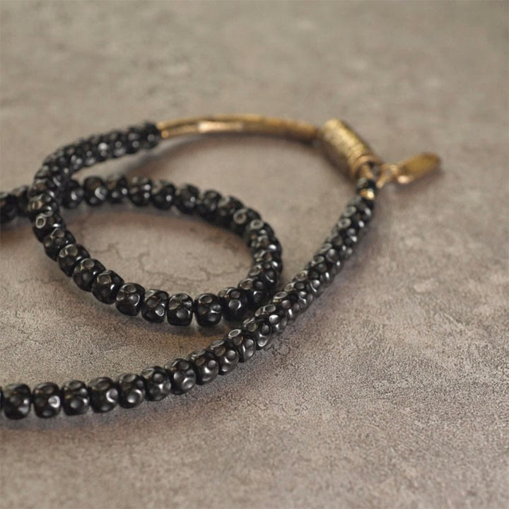 Pulsera de triple envoltura de cobre con concha de coco retro de Buddha Stones