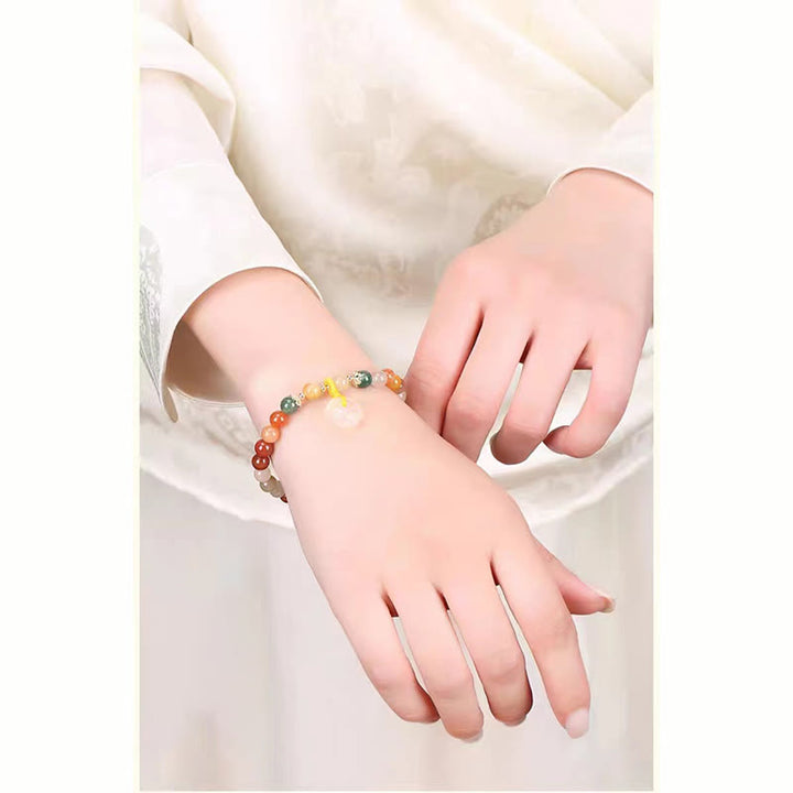 Pulsera de riqueza con hebilla de paz de jade de seda dorada colorida chapada en oro de 14 Buddha Stones