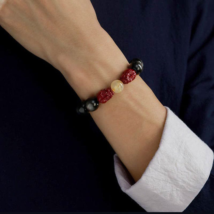 Pulsera de protección Om Mani Padme Hum de cinabrio PiXiu de obsidiana con brillo dorado de Buddha Stones