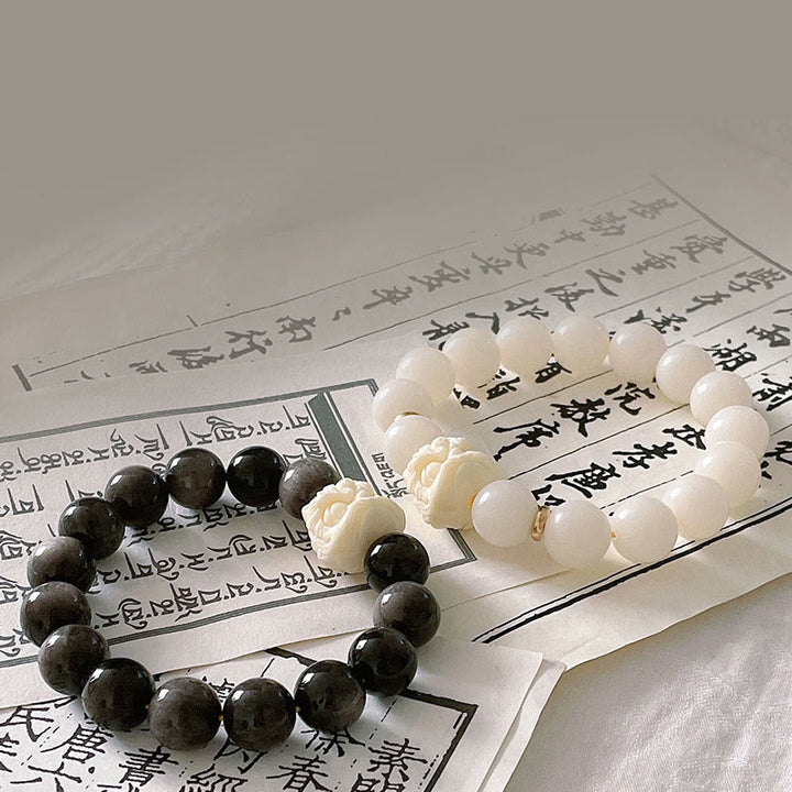 Pulsera de protección con Buddha Stones, obsidiana con brillo plateado, semilla de Bodhi, marfil, fruta, león danzante