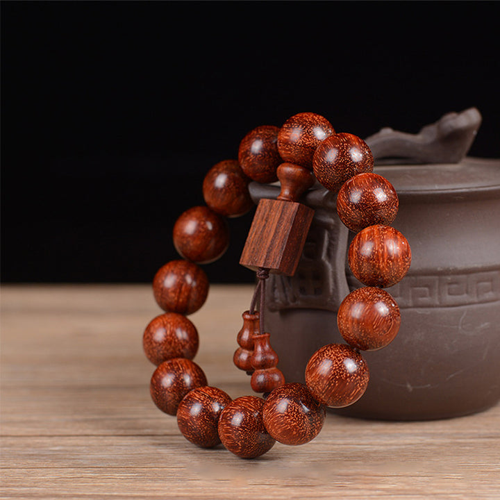 Pulsera de relajación de sándalo rojo de hoja pequeña tibetana con Buddha Stones