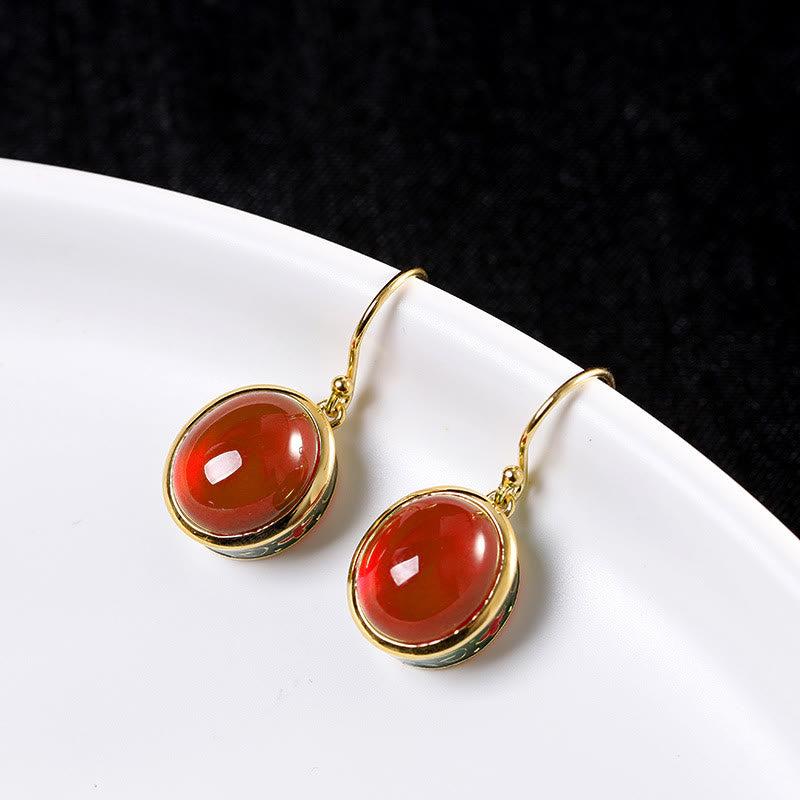 Pendientes colgantes con forma de gancho de confianza de corindón rojo redondo con Buddha Stones