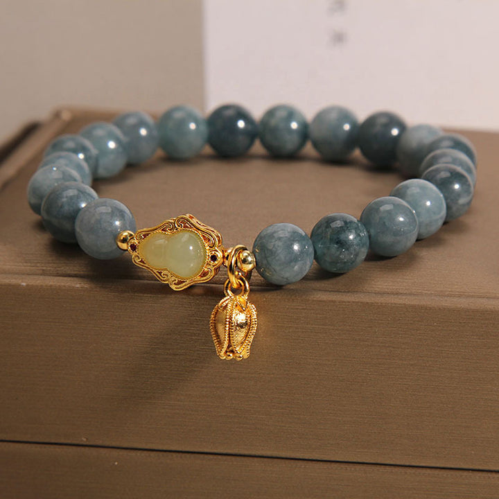 Pulsera de la suerte con dije de tulipán y calabaza de jade natural con Buddha Stones