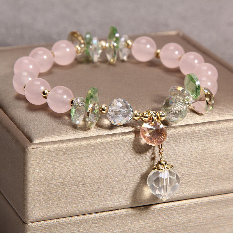 Pulsera con dije de paz y cristal rosa con ojo de gato y Buddha Stones - image 2