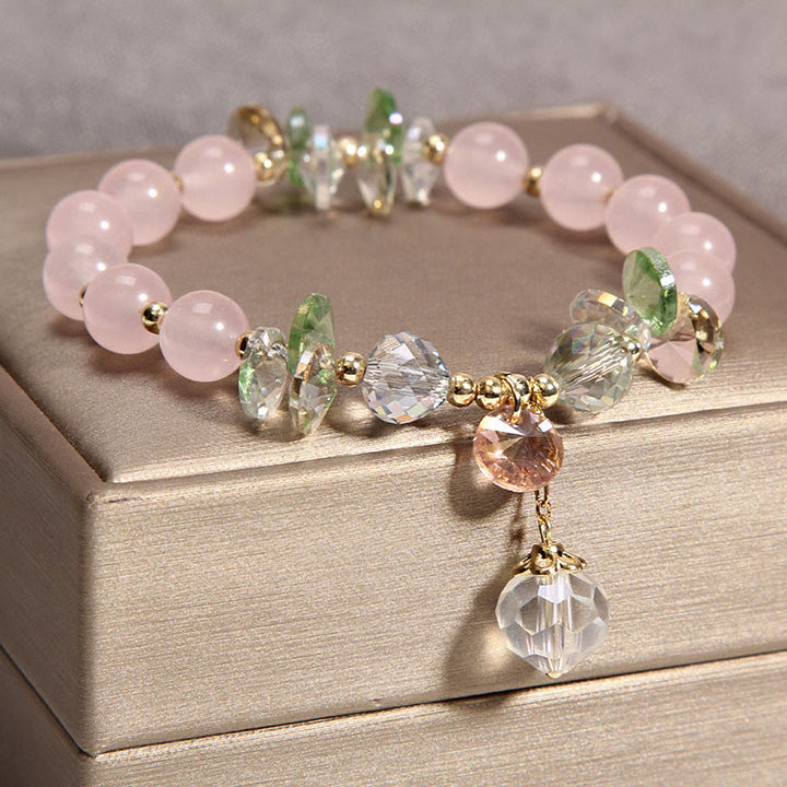 Pulsera con dije de paz y cristal rosa con ojo de gato y Buddha Stones - image 2