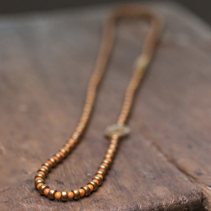 Pulsera de riqueza de cobre con hueso de olivo retro con Buddha Stones