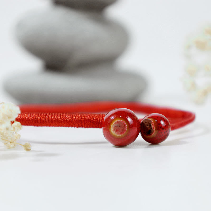 Pulsera de cerámica con hilo rojo de la suerte FengShui de Buddha Stones