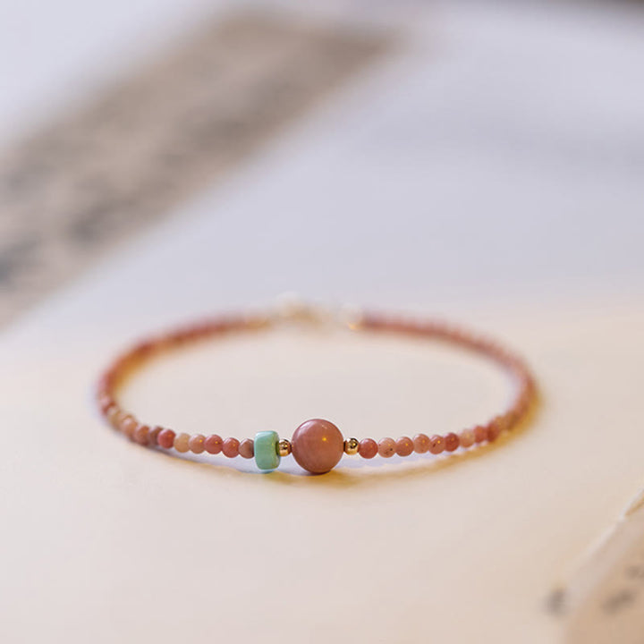Pulsera de cadena de energía amorosa de rodonita natural chapada en oro de 14 quilates con Buddha Stones